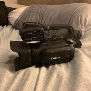 Barely Used Canon XA15 Camcorder with accessories as shown in pictures.